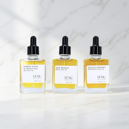 Three bottles of LENU Botanicals face oils on a white background