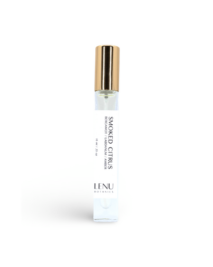 Small bottle of 'Smoked Citrus' perfume by Lenu on a white background