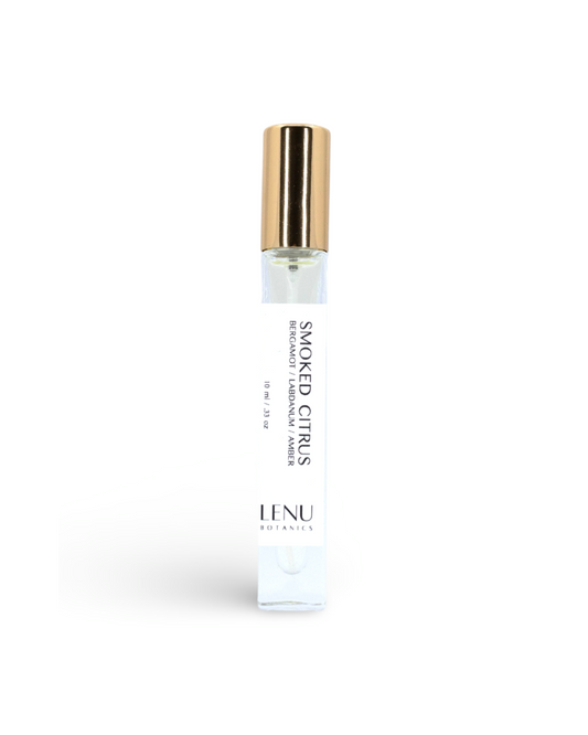 Small bottle of 'Smoked Citrus' perfume by Lenu on a white background