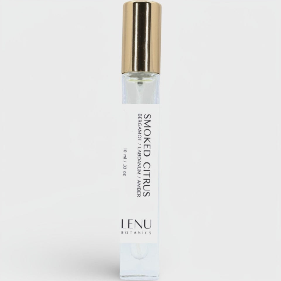 Rotating bottle of Smoked Citrus perfume